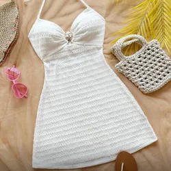 Vestido blanco con detalle de estrellita dorada