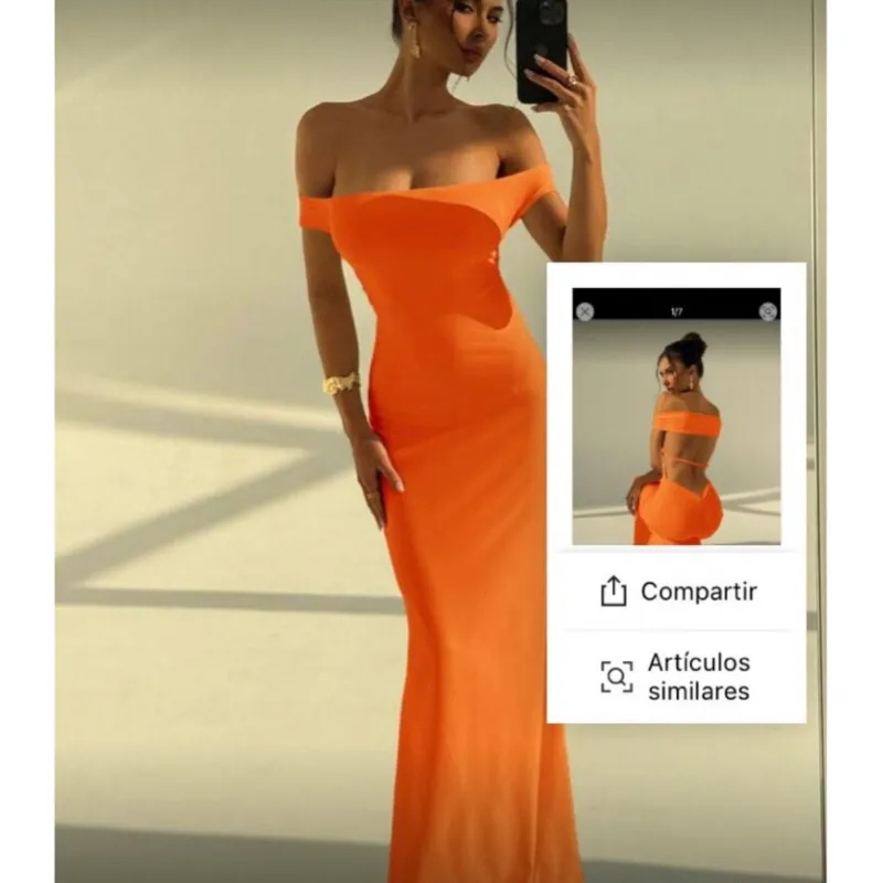 Vestido naranja con espalda afuera