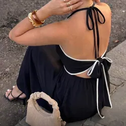 Vestido negro con lazo negro y blanco trasero