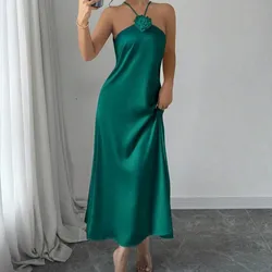 Vestido verde con flor central