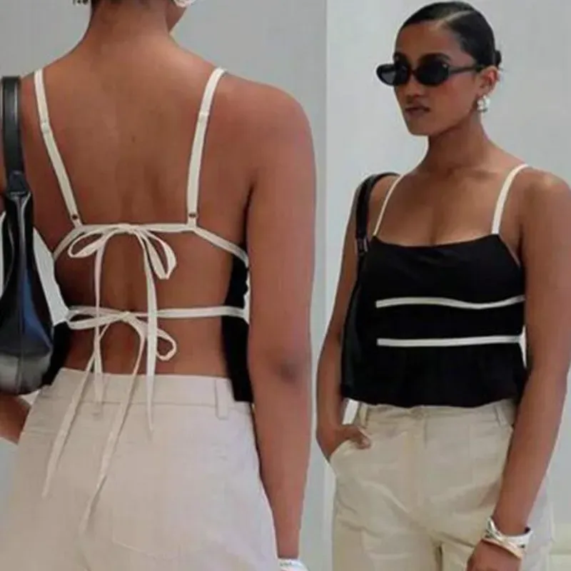 Blusa negra tirantes blancos