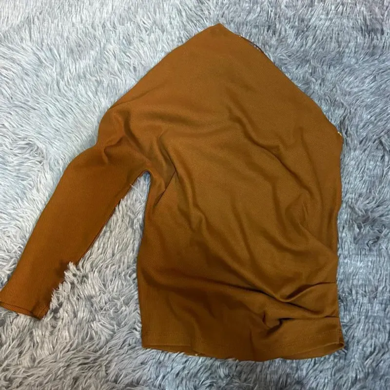 Blusa una manga