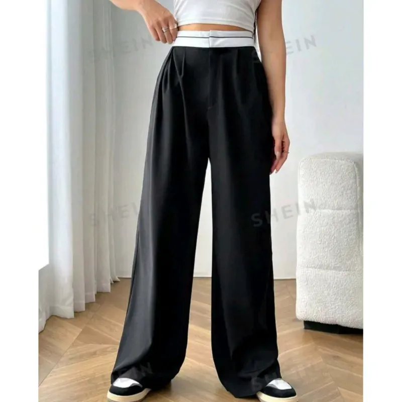 Pantalón negro de fajin blanco