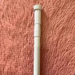 Cortinero extensible para baño 