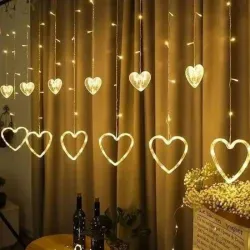 Cortina de luces led con adorno de corazón
