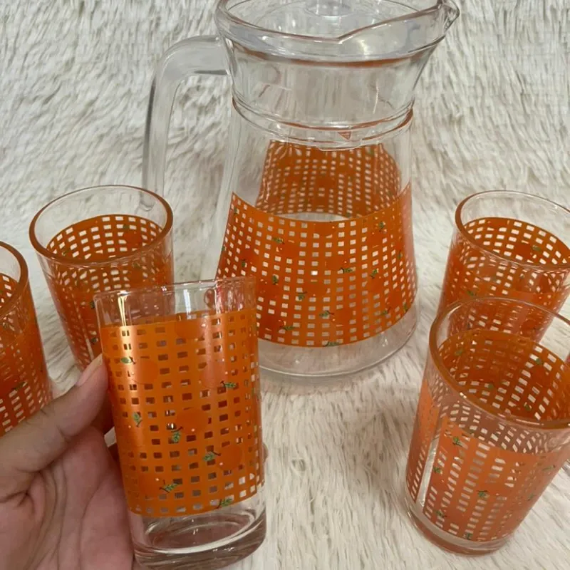 Juego de jarra con vasos