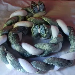 Protector trenzado para cuna