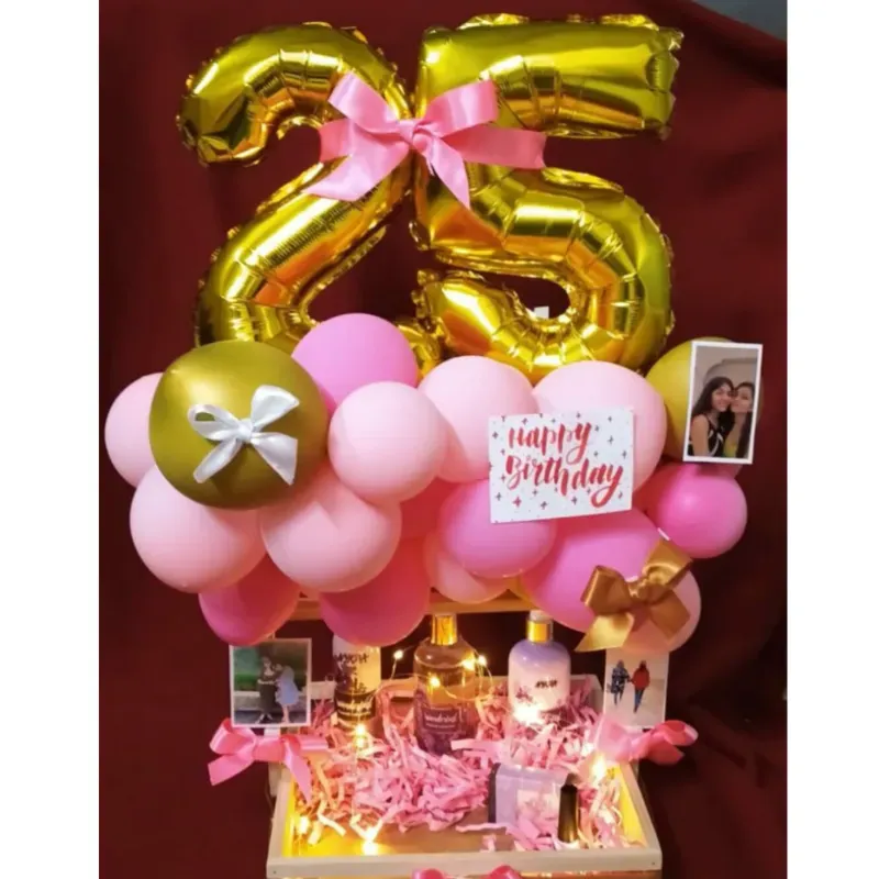 Caja de regalo con globos, confituras y colonia