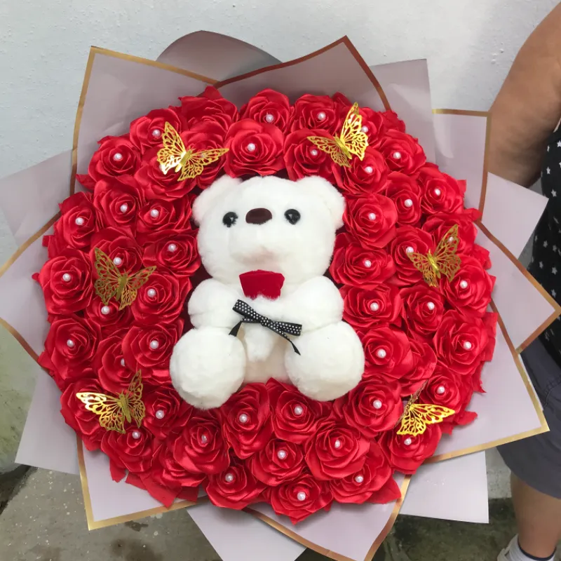 Ramo de rosas eternas con peluche incluido 