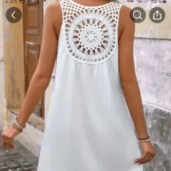 Vestido blanco bordado en la espalda