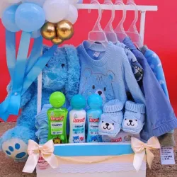 Cesta de bebe con peluche ,zapaticos y ropita