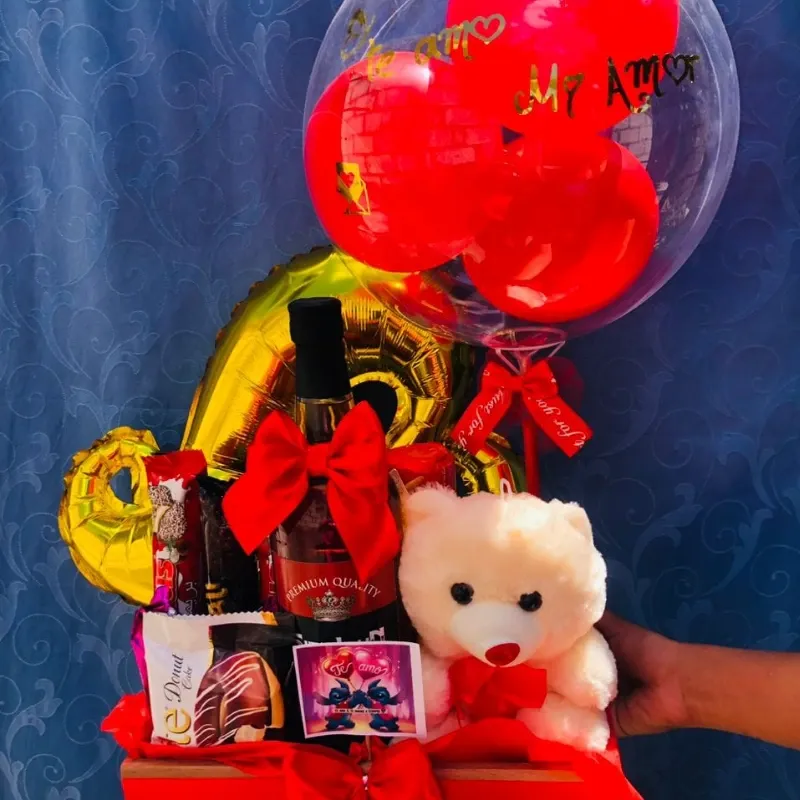 Regalo con botella y peluche