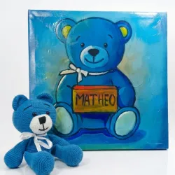 Peluche con cuadro decorativo