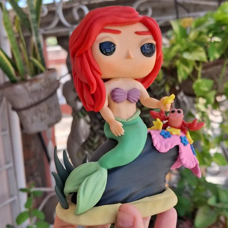 Funko Pop Sirenita Ariel  en la roca + Sebastián