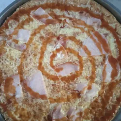Pizza familiar con queso gouda y Lomo ahumado