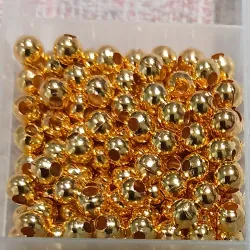 Balines plásticas dorados 4mm
