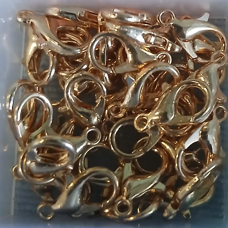 Broche de perico dorado