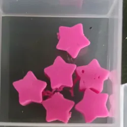 Estrellas rosa oscuro