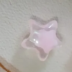 Estrella rosa claro