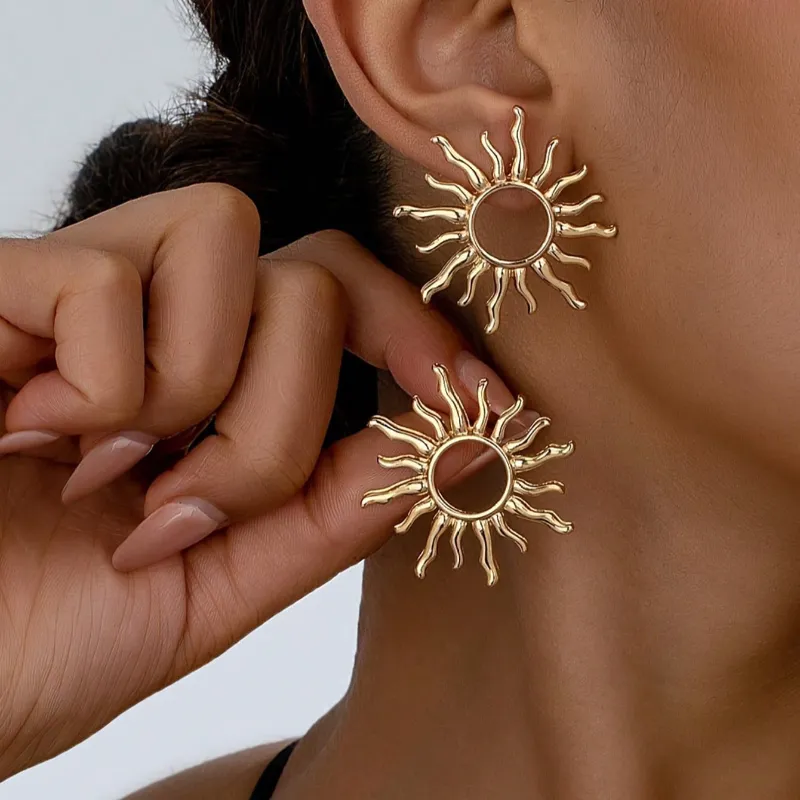Aretes en forma de sol 