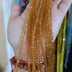 Cristal, dona de 4mm color miel