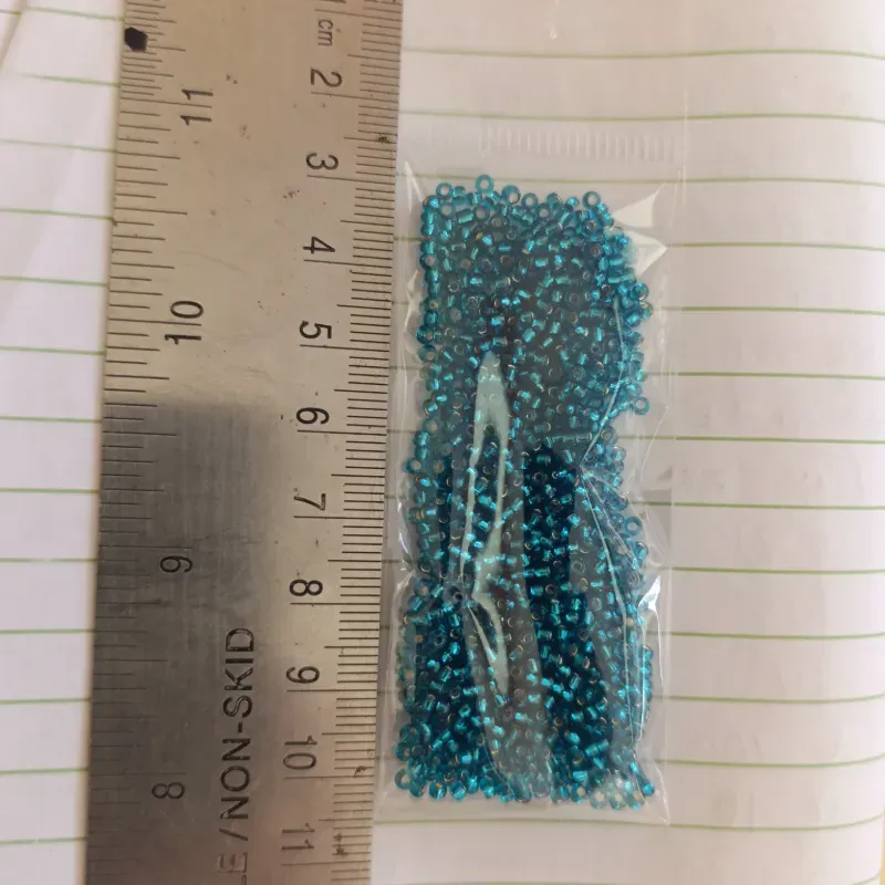 Chaquira calibrada azul claro 2 mm