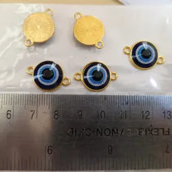 Conector en forma de ojo turco azul 🧿 con fondo dorado 