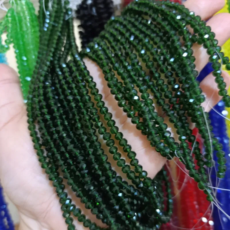 Cristal tipo dona de 4 mm verde oscuro transparente 