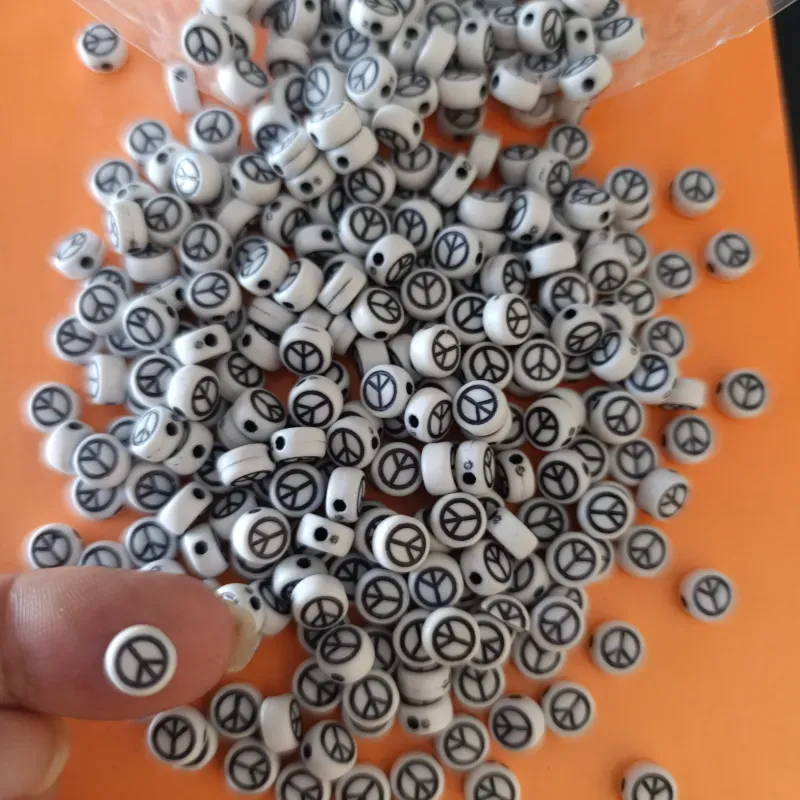 Cuentas plásticas con signo de la paz 🕊️