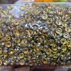 Rondel de 6mm dorado con incrustaciones