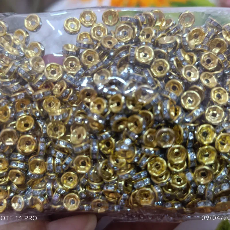 Rondel de 6mm dorado con incrustaciones 