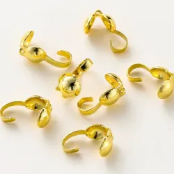 Tapanudos dorados con engarce