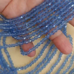 Tira de cristal de 4mm color azul claro forma de 'Trompo'