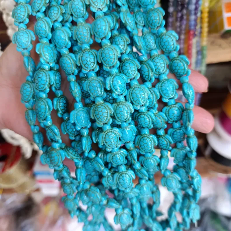 Tira de tortugas azules de piedra turquesa 