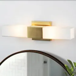 Lampara dorada para encima del espejo