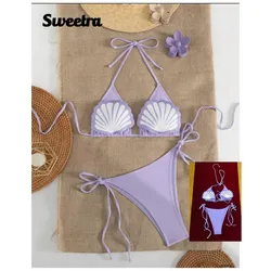 Bikini color malva y blanco con conchas en relieve