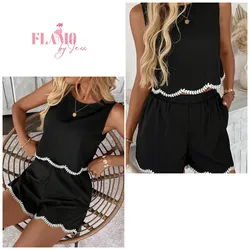 Conjunto color negro bordes blancos bordados