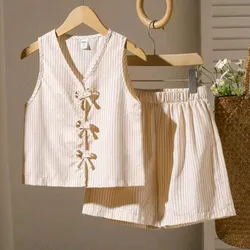 Conjunto de lazos y rayas blanco y beige