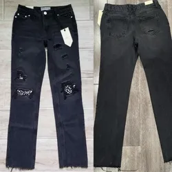 Jean mezclilla oscuro detalles de piedras