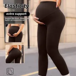 Leggin para maternidad (embarazo) ajustado al cuerpo color marrón.