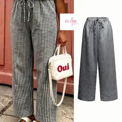 Pantaloneta piernas anchas cuadros negra y blanca