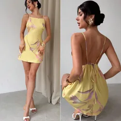 Vestido amarillo estampado tropical