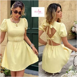 Vestido amarillo mangas cortas detalle de lazo detras