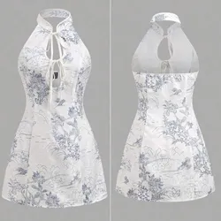 Vestido blanco con cuello estampado y amarre de lazos delante