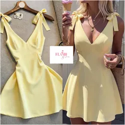 Vestido color amarillo corte princesa amarre en los hombros