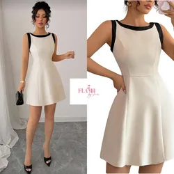 Vestido color beige con detalles en negro estilo princesa