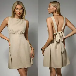 Vestido color beige lazo detras