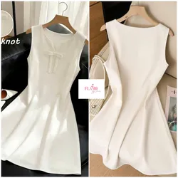 Vestido tono blanco hueso con detalle de lazo