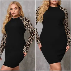 Vestido color negro de mangas largas con estampado animal print