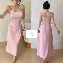 Vestido color rosa con detalle de lazos